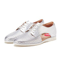The Rollie Womens Sidecut Punch Silver Metallic Leather Shoe features stylish perforated detailing for breathability, white soles, and a side cutout showing a pink insole., 9339554231341, 9339554231358, 9339554231365, 9339554231372, 9339554231389
