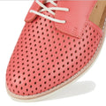Coral-colored Rollie Womens Sidecut Punch Coral Paradise Leather oxford shoe featuring a diamond-patterned punch-hole design and white laces., 54741, 54742, 9382760798733, 9382760798740, 9382760798757, 9382760798764, 54747