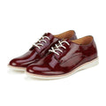 Pair of maroon leather Rollie derby Super Soft Wine Crinkle Patent shoes with white laces on a white background.,
9781760788742,
9781760788759,
9781760788766,
9781760788773,
9781760788780,
9781760788797,
9781760788803,