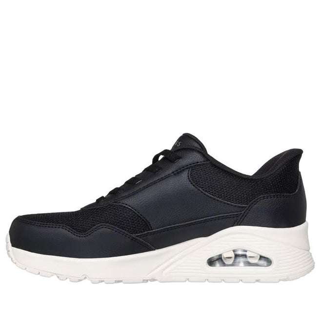 Side view of a Skechers black womens uno Banksia slip in with a white sole.,
198376467814,
198376467838,
198376467852,, 45033, 45034, 45035, 45036, 198376467814, 45038, 198376467838, 45040, 198376467852, 45042