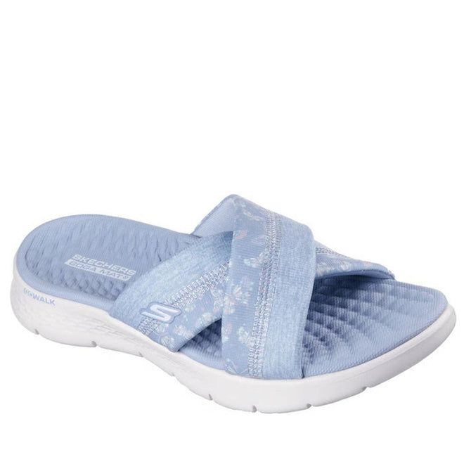 The Skechers Go Walk Flex Women's Sandal Slides Butterfly Bliss in periwinkle feature crisscross fabric straps with a subtle butterfly print, a cushioned Goga Mat footbed, and a white textured sole.