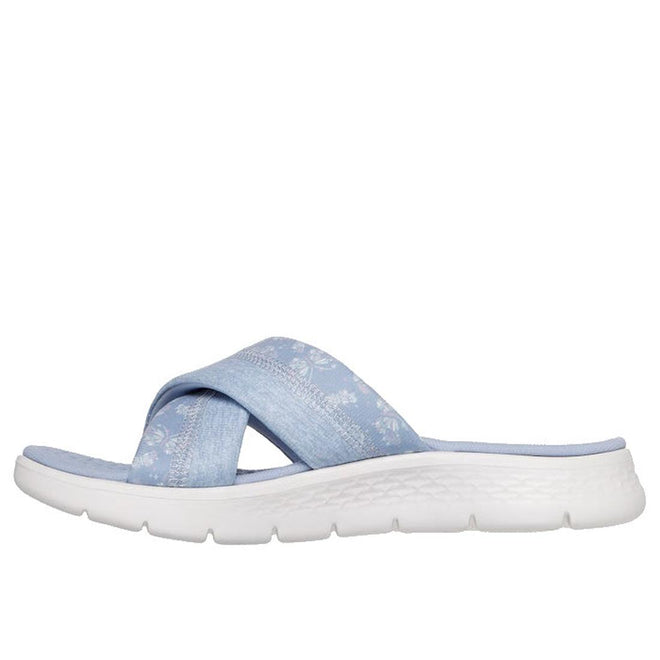 Periwinkle Skechers Go Walk Flex Women's Sandal Slides Butterfly Bliss with wide crisscross fabric straps and subtle white butterfly patterns, featuring a cushioned Goga Mat footbed and thick white textured sole. Background is plain white., 47970, 47971, 199025957625, 199025957632, 199025957649, 199025957656, 47976