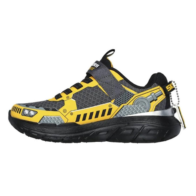 The Skechers Kids Skech Tracks Charcoal Yellow Tuff Truck Trainer is a gray and yellow athletic shoe with black accents, a mechanical design on the side, black sole, cushioned insole, and a silver keychain on the heel., 197627197722, 197627197746, 197627197760, 197627197784, 197627197807, 197627197821, 38355