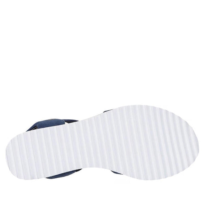 The image shows the bottom view of the Skechers Womens Bobs Desert Kiss Golden Lily Navy SLIP IN with a white, ridged sole featuring evenly spaced horizontal grooves for grip and a dark upper part visible at the heel., 49030, 198739558746, 198739558760, 198739558784, 49034, 49035