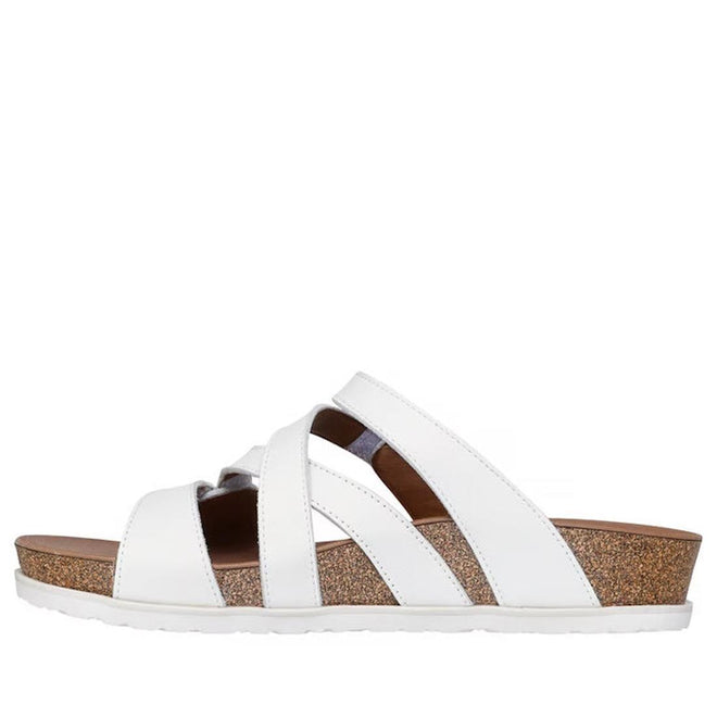 The Skechers Women's Arch Fit Granola Slim White Slide features multiple white leather crisscross straps, a supportive footbed, brown cork wedge sole, and a white rubber outsole, shown in profile against a plain background., 49043, 198739182224, 198739182231, 198739182248, 198739182255, 49048, 49049
