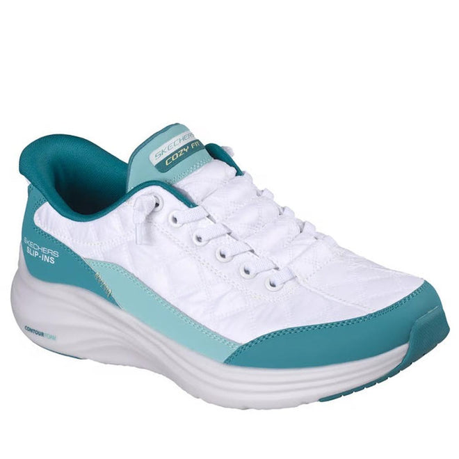 The Skechers Womens Slip In Contour Foam Cozy Fit White Turquoise features a thick, cushioned sole, teal accents, white laces, Air-Cooled Memory Foam for comfort, and displays the Skechers logo on the side and tongue.