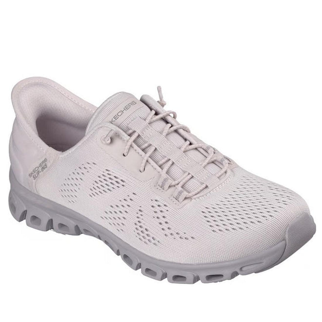 The Skechers Womens Slip In Glide Step Amore Lavender WIDE WIDTH Trainer features a mesh upper, slip-in design, thick textured sole, subtle branding, and Air-Cooled Memory Foam for breathable, all-day cushioned comfort.