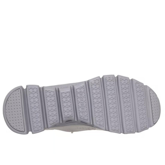 The image displays the gray, textured sole of the Skechers Womens Slip In Glide Step Amore Lavender WIDE WIDTH Trainer with horizontal grooves and patterned treads for grip, viewed from the bottom against a white background., 50625, 198739310955, 198739310979, 198739310993, 50629, 50630