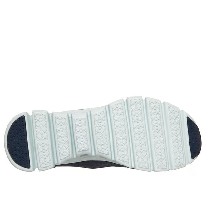 The image shows the bottom view of the Skechers Womens Slip In Glide Step Amore Navy WIDE WIDTH Trainer, highlighting its segmented white rubber sole with textured patterns and deep horizontal grooves for flexibility and grip., 198739311068, 198739311082, 198739311105, 198739311129, 198739311143, 198739311150