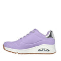 The Skechers Uno Shimmer Away Lilac Trainer Pull On is shown in a side profile, featuring a white sole with visible air cushion, gum outsole, metallic silver heel accent, and Air-Cooled Memory Foam for all-day comfort., 38381, 38382, 197627487144, 38384, 197627487168, 38386, 197627487182, 38388, 38389, 38390