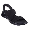 Right foot outer side and front view of a Black  Skechers Slip In enticing sandal with a strap on a white background. Shows the ridgid but padded heel stap taht allows the foot to slip into the sandal,  strap across the top of the foot and toes