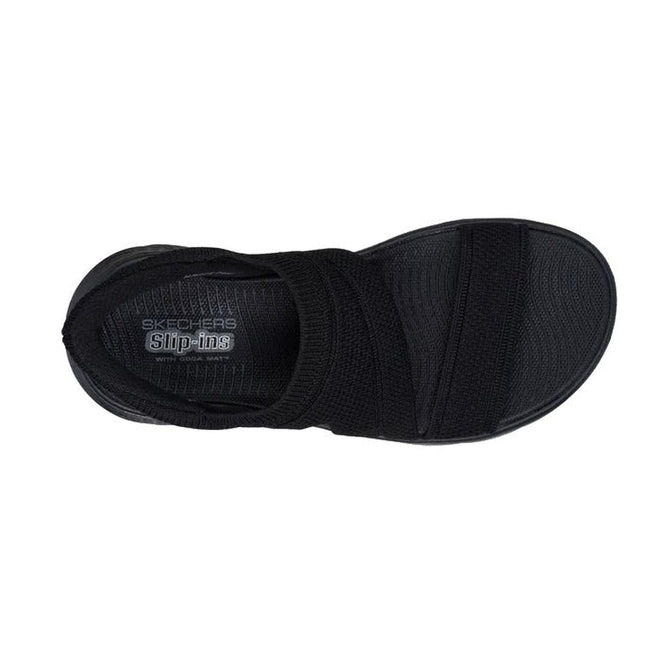 Black slip-in sandal top down view with 'Skechers' branding on a white background. Shows the backstrap, stop over the toe and strap over the top of the foot.,
197627456614,
197627456621,
197627456638,
197627456645,
197627456652,