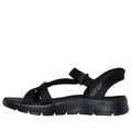 Side view of outer foot of Skechers Illuminate slip in Black sandal with white sole on a white background.,
197627456096,
197627456102,
197627456119,