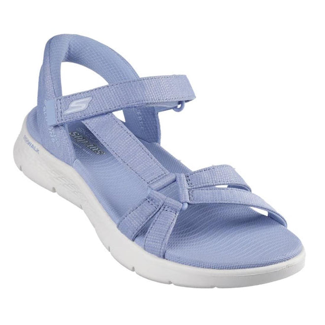 Light periwinkle blue Skechers slip in Illuminate sandal with rigid heel but padded heel strap that allows the foot to slip in. Velcro adjustable strap over the top of the foot, thin strap on the outer foot that attachs to the double straps over the toe  white sole on a white background.,
198739039092,
198739039108,
198739039115,
