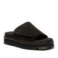 The Dr Martens Zebzag Black EH Suede Slide Sandal features a thick, ridged air-cushioned sole, visible yellow stitching, an open toe design, and a small metallic brand tag on the upper strap.
