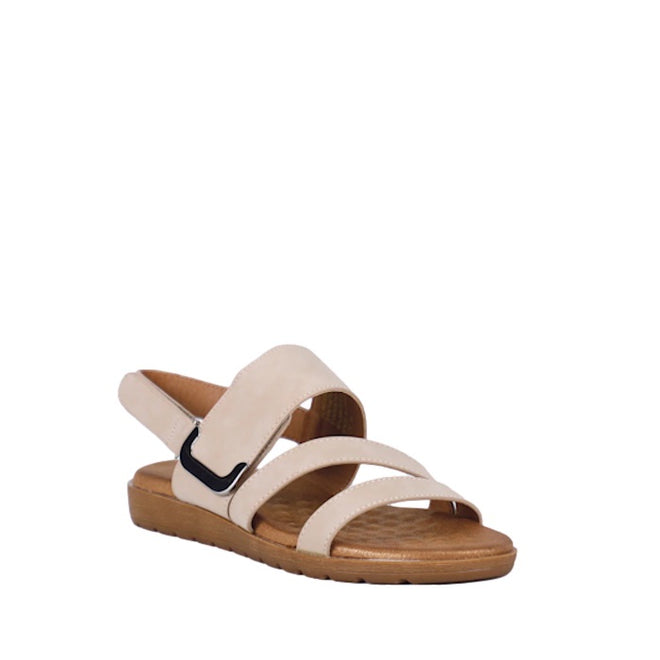 Introducing the Soultbush Flinders Beige Women’s Sandal with Back Strap: This sandal features a three-strap design in beige, an open toe, and a slingback heel. The tan cushioned sole ensures enhanced comfort. One strap includes a small black buckle accent, while another offers an adjustable Velcro strap for a customizable fit. Shown against a plain white background.
