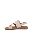 The Soultbush Flinders Beige Women’s Sandal with Back Strap features a synthetic upper, two front straps, an ankle strap with a side zipper, and a cushioned footbed with a brown sole, displayed on a white background.