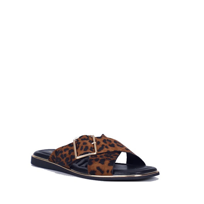 The Soultbush Luca Leopard Womens Sandal Slide is a chic flat sandal showcasing crisscross brown straps with a bold black leopard print, a sleek black sole, and an elegant gold buckle detail—perfect summer sandals designed for effortless style.