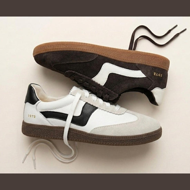 Two Gelato Staton Swan Off White and Cafe Leather Lace Women's Sneakers are displayed side by side, featuring gum soles, retro design, and "1972" in gold on the heel—one in off-white with black accents, the other in brown with white details., 52483, 52484, 52485, 52486, 52487, 52488