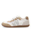 The Woden Nanna Blanc De Blance is a white and beige lightweight sneaker featuring suede accents, perforated sides, white laces, a textured brown heel patch, and a light brown gum sole.