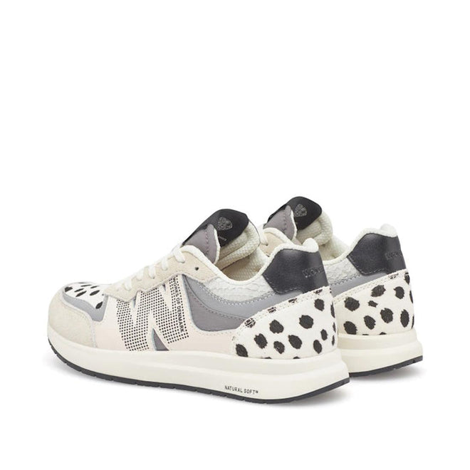 The Woden Rigmor Animal Damlation Lace Up Sneaker features a white base with black dalmatian-style spots, light gray and beige accents, and a thick white sole., 5713326695267, 5713326695274, 5713326695281, 5713326695298, 5713326695304, 5713326695311
