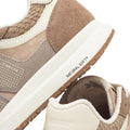 Close-up of Woden Rigmor Heritage Coffee Cream Lace Up Sneakers with beige and tan textured details, LWG certified suede, white soles, "NATURAL SOFT™" on the midsole, DENMARK text, and a patterned heel lining., 50259, 5713326695113, 5713326695120, 5713326695137, 50263, 50264