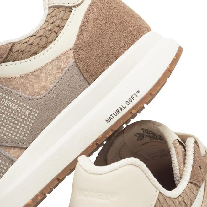 Close-up of Woden Rigmor Heritage Coffee Cream Lace Up Sneakers with beige and tan textured details, LWG certified suede, white soles, "NATURAL SOFT™" on the midsole, DENMARK text, and a patterned heel lining., 50259, 5713326695113, 5713326695120, 5713326695137, 50263, 50264