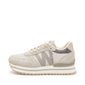 The Woden Ronja Plateau Delpin Lace Up Sneaker features a beige and cream suede finish, textured sole, perforated sides, and subtle fish leather accents, shown in a side view on a white background.
