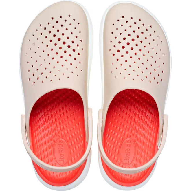 The Crocs In Motion Clog in Quartz Browny Pink features beige uppers with small ventilation holes, bright red insoles, and a white back strap for added support and comfort with Free Feel Technology. Viewed from above., 49764, 49765, 49766, 49767, 49768, 49769, 49770, 49771, 198445359804, 198445359811, 198445359828, 198445359835, 198445359842, 49769, 49770, 49771
