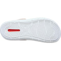The image displays the white rubber outsole of the Crocs In Motion Clog Quartz Browny Pink, featuring textured grip patterns and curved grooves. Near the heel, a small red rectangle with Free Feel Technology is visible., 49764, 49765, 49766, 49767, 49768, 49769, 49770, 49771, 198445359804, 198445359811, 198445359828, 198445359835, 198445359842, 49769, 49770, 49771