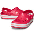 A pair of Crocs Crocband Clog Digital Raspberry Mens Womens, featuring bright pink color, white and pink striped soles, ventilation holes on top, and adjustable heel straps.