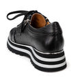 The Alfie & Evie Hosting Womens Leather Shoe features a black and silver design, thick striped platform sole, black laces, side zipper detail, and is shown from the back angle., 50827, 50828, 50829, 50830, 50831, 50832, 50833