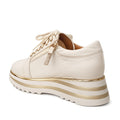 The Alfie & Evie Hosting Womens Leather Shoe in Cream/Gold features a thick striped platform sole, beige laces, side zipper detail, and lightweight leather. Shown here from the back left angle., 38135, 9353738178833, 9353738178840, 9353738178857, 9353738178864, 9353738178871, 38141