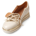 The Alfie & Evie Hosting Womens Leather Shoe Platform in cream/gold features gold accents, a side zipper, thick sole, decorative laces, and tan leather detail—delivering stylish comfort in a lightweight women's sneaker., 38135, 9353738178833, 9353738178840, 9353738178857, 9353738178864, 9353738178871, 38141