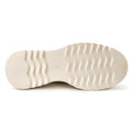 Bottom view of the Alfie & Evie Hosting Womens Leather Shoe in cream/gold, showing a beige sole with wavy ridges and a small central circle. This lightweight leather platform blends style and comfort., 38135, 9353738178833, 9353738178840, 9353738178857, 9353738178864, 9353738178871, 38141