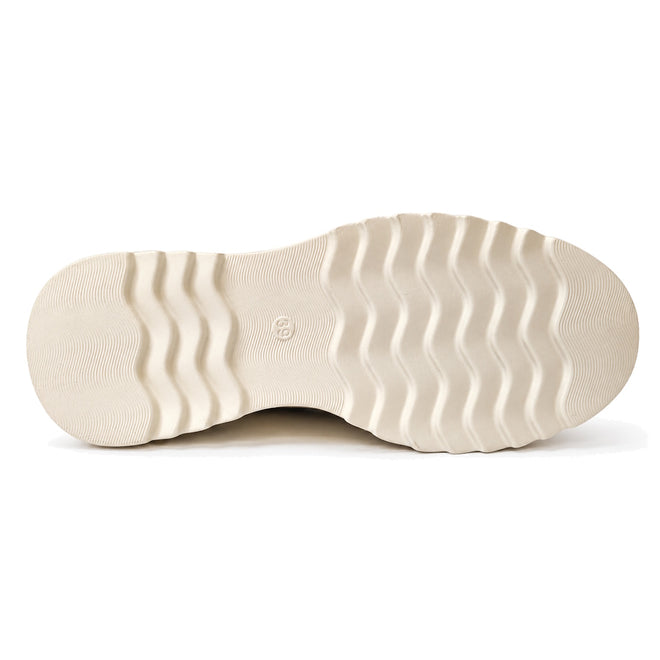 Bottom view of the Alfie & Evie Hosting Womens Leather Shoe in cream/gold, showing a beige sole with wavy ridges and a small central circle. This lightweight leather platform blends style and comfort., 38135, 9353738178833, 9353738178840, 9353738178857, 9353738178864, 9353738178871, 38141