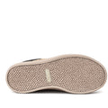 The image shows the textured beige platform sole of the Alfie & Evie Isaac Black Leather Womens Platform Sneaker Rose Gold, viewed from below. The surface has a pebbled texture and a small rectangular branded label near the center.