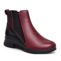 The Alfie & Evie Junior Bordo Purple Lo Leather Ankle Boot for women features a smooth bordo purple front, black back, black elastic side panels, memory foam insole, black sole, and a pull tab at the heel.