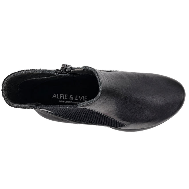 Top view of the Alfie & Evie Junior Black Lo Leather Ankle Boot for women, featuring elastic side panel, zipper detail, and a memory foam insole. Stamped with ALFIE & EVIE MELBOURNE DESIGN., 50883, 50884, 50885, 50886, 50887, 50888, 50889