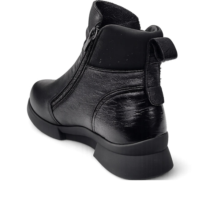 The Alfie & Evie Justice Black Lo Leather Zip Ankle Boot for women features black leather, a side zipper, rear pull tab, chunky angled heel, and removable memory foam insole, shown here from a rear side angle., 50890, 50891, 50892, 50893, 50894, 50895, 50896