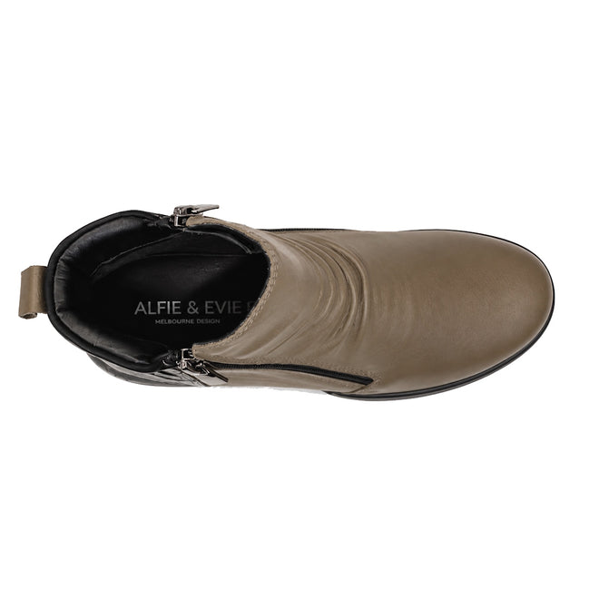 Top view of the Alfie & Evie Justice Khaki Lo Leather Zip Ankle Boot for women, featuring a side buckle, black sole, and ALFIE & EVIE branding on the removable memory foam insole., 50897, 50898, 50899, 50900, 50901, 50902, 50903