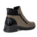 The Alfie & Evie Justice Khaki Lo Leather Zip Ankle Boot for women features a taupe leather upper, black textured heel and sole, side zipper, matte front finish, shiny embossed black back panel, and a removable memory foam insole., 50897, 50898, 50899, 50900, 50901, 50902, 50903