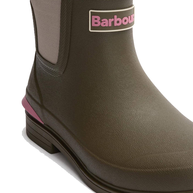 Close-up of Barbour Abbeyfield Packable Ankle Wellingtons in Olive, featuring a front logo and heel accent, ideal as lightweight or festival boots, shown against a plain white background., 51830, 51831, 5063669171264, 5063669171271, 5063669171288, 51835, 51836