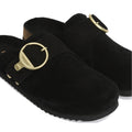 The Barbour Kyra Womens Closed Toe Clog Sandal in black suede features a slip-on design with a cork insole, wide black strap, and a bold round gold buckle across the top., 5063669169339,
5063669169346,
5063669169353,
5063669169360,
5063669169377,, 5063669169339, 5063669169346, 5063669169353, 5063669169360, 5063669169377, 51856