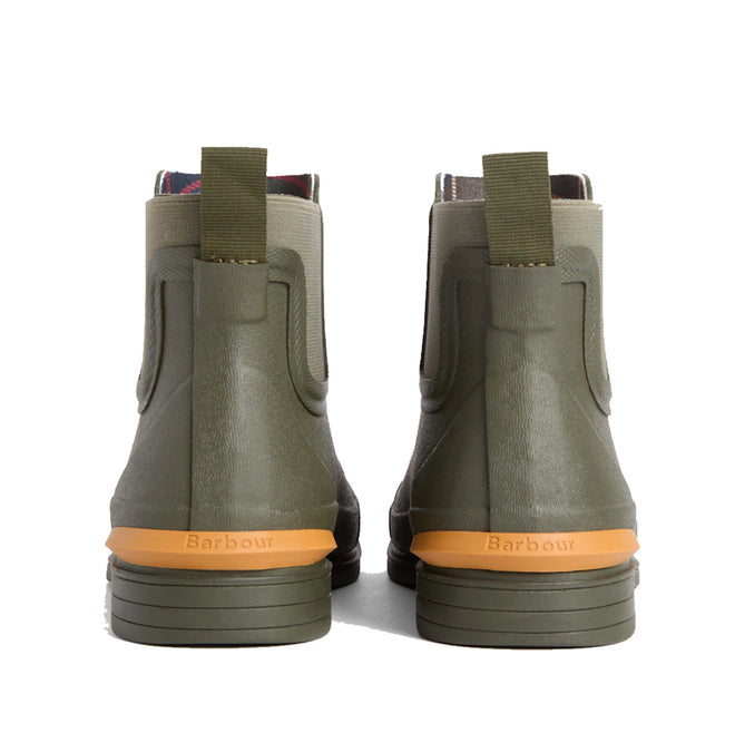 A pair of Barbour Abbeyfield Packable Ankle Wellingtons in olive are pictured from the rear, featuring tan soles with brown heel sections embossed with the Barbour brand name and pull tabs at the back. These lightweight ankle wellies combine practicality with style., 51830, 51831, 5063669380604, 5063669380611, 5063669380628, 51835, 51836