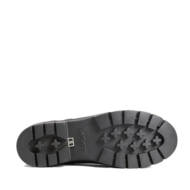 The image shows the black rubber sole of a shoe with deep treads and a size label reading 51. The rugged design, featuring rectangular and cross-shaped patterns, is characteristic of women’s wellingtons like the Barbour Hepburn Platform Ankle Wellingtons Boots Black., 54330, 54331, 5063669379622, 5063669379639, 5063669379646, 54335, 54336