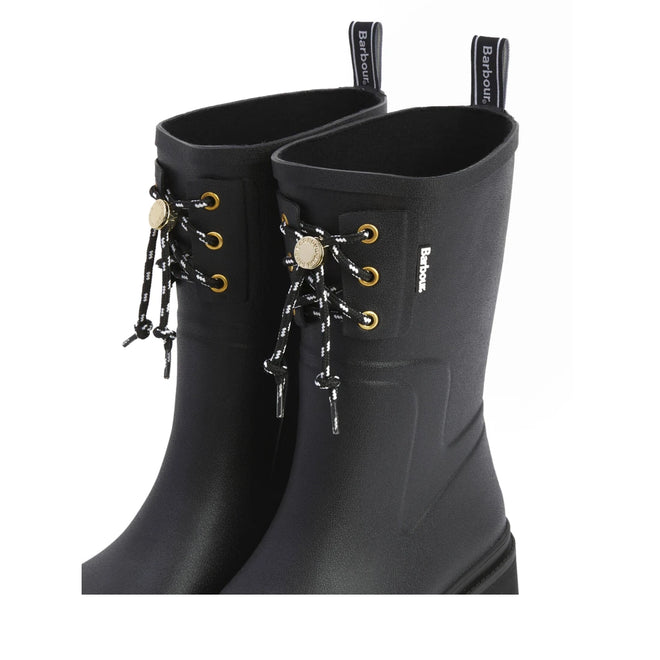 The Barbour Devlin Black Mid Calf Wellys Womens Rainboot features black and white laces through gold eyelets, a decorative gold emblem at the front, and Barbour branding—stylish and perfect for rainy days., 51446, 5063669171547, 5063669171554, 5063669171561, 51450, 51451