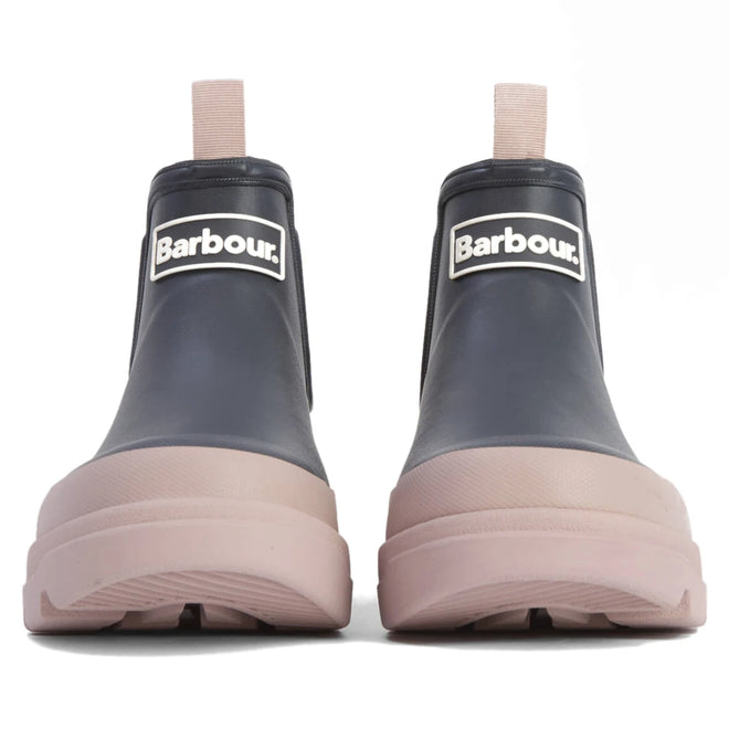 The Barbour Nimbus Dusky Grey/Gardenia Pink Chelsea Wellingtons Womens Rainboot features Chelsea boot-inspired ankle rain boots in navy with thick, light pink soles and pull tabs, displayed from the front against a white background., 5063669171677, 5063669171684, 5063669171691, 5063669171707, 5063669171714, 5063669171721