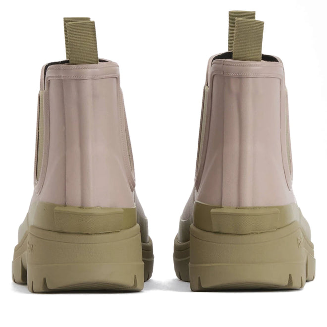 Barbour Nimbus Gardenia Pink/Bleached Olive Chelsea Wellingtons women's rainboot, ankle-height with Chelsea style, chunky bleached olive soles, beige-pink upper, and heel pull tabs viewed from the back., 5063669171745, 5063669171752, 5063669171769, 5063669171776, 5063669171783, 5063669171790