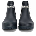 A pair of Barbour Wilton Navy Chelsea Wellingtons women's rain boots with chunky soles, shown from the front. These navy ankle boots feature a white Barbour logo patch on each shaft., 190375411744, 190375411867, 190375412055, 190375412123, 190375412222, 51392